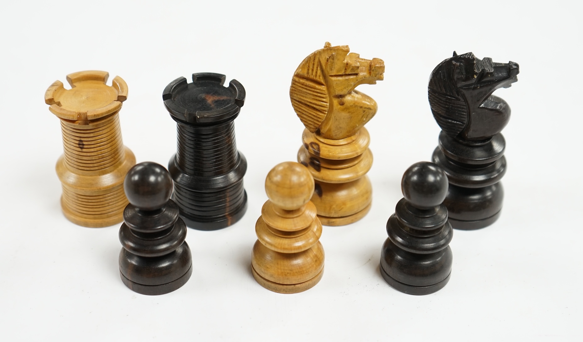 A Staunton turned wood chess set. Condition - good